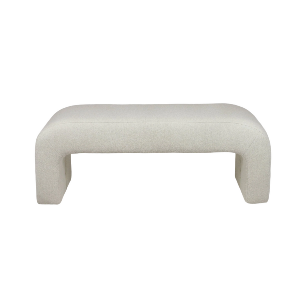59-inch off-white boucle upholstered backless bench with rounded arched legs and a low-profile modern coastal silhouette, photographed on a white background.