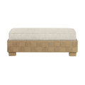Low rectangular bench with a cream-beige boucle upholstered cushion set on a natural woven wood base with a checkerboard basketweave pattern and short block legs.