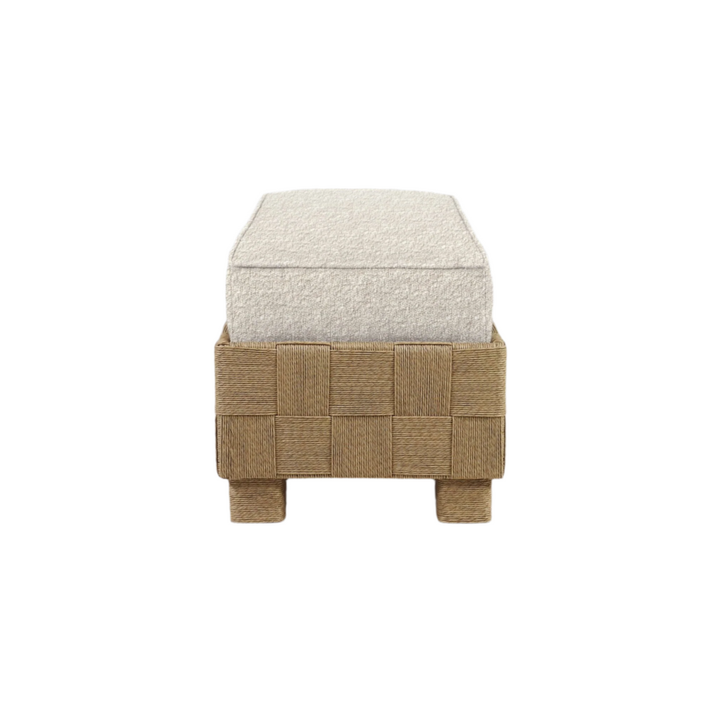 Cream boucle-upholstered cushion atop a natural woven seagrass-style wooden bench frame with square basket-weave panels and short wrapped block legs, shown front view.
