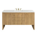 Modern 60-inch single-sink freestanding bathroom vanity in natural oak with a white stone quartz top, rectangular undermount sink, brass widespread faucet, three center drawers and two side cabinets with brass knobs.