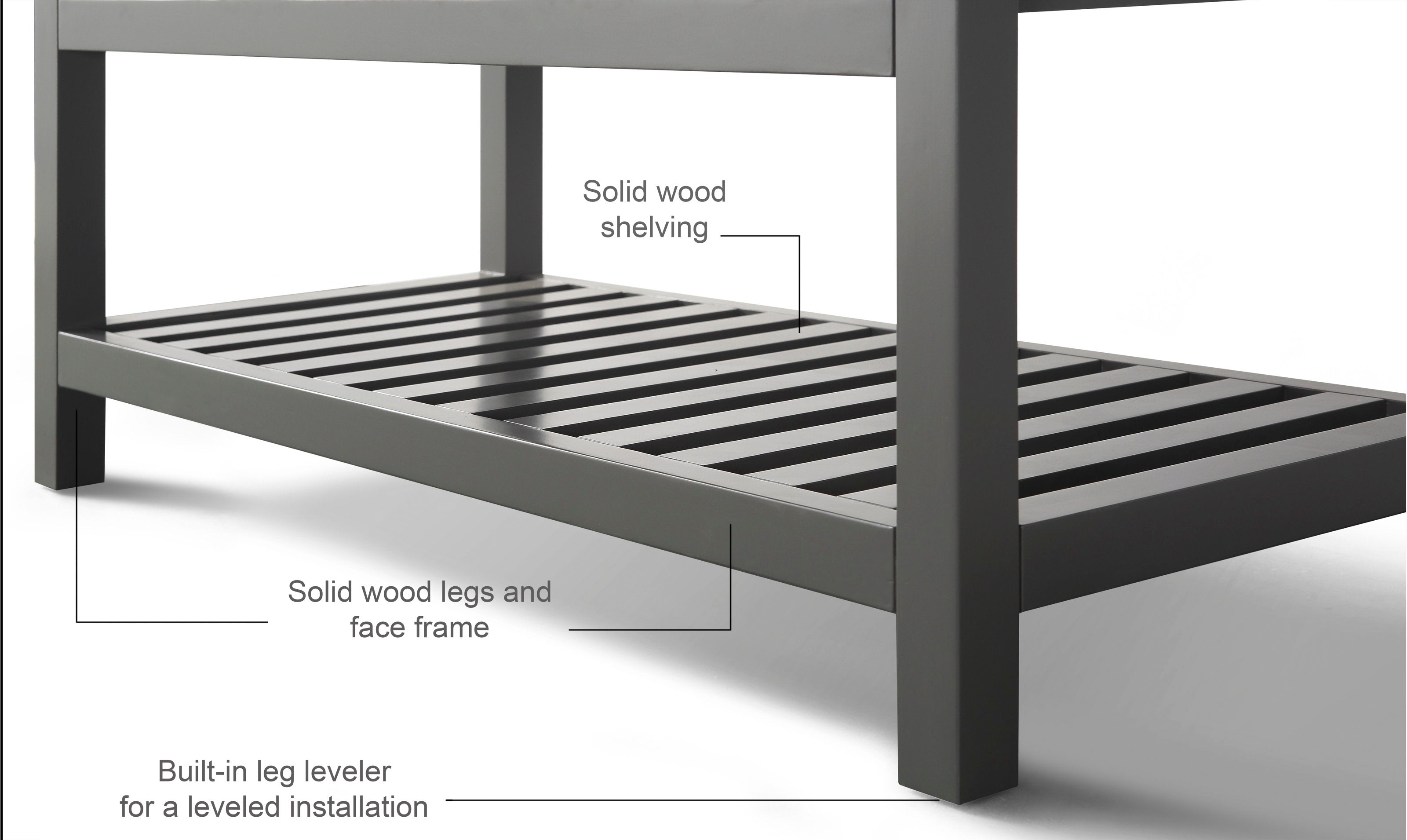 Close-up of a stone-colored modern bathroom vanity showing the solid wood slatted lower shelf, square wood legs and face frame, with visible slats and a built-in leg leveler for a leveled installation.