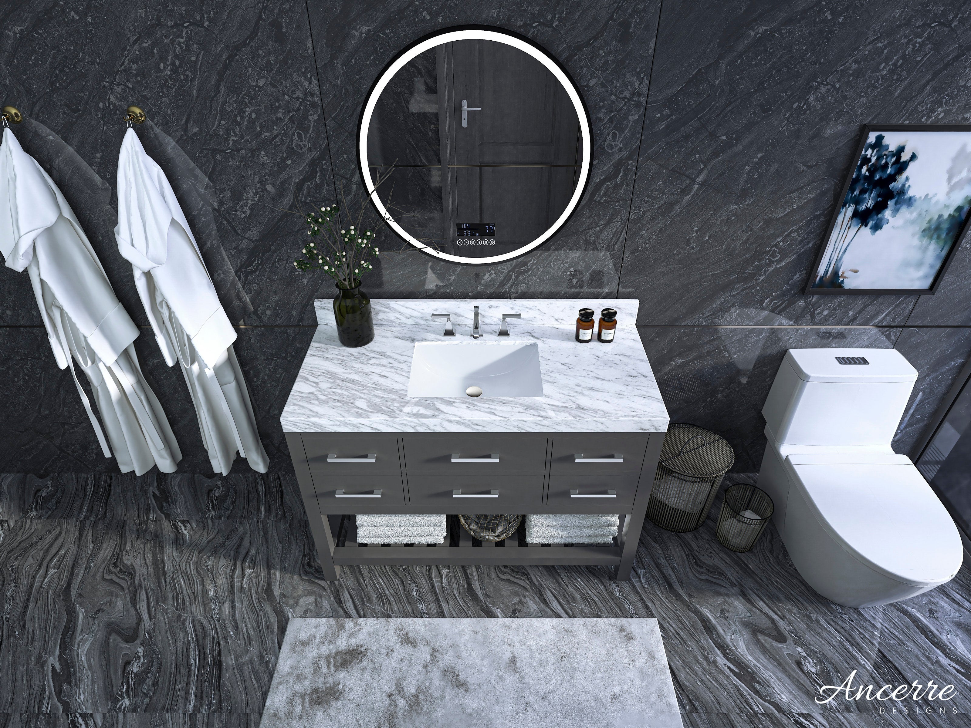 Contemporary 48-inch solid wood bathroom vanity with a white marble top and rectangular undermount sink, gray base with six drawers and open towel shelf, round illuminated mirror, dark stone walls and a white toilet nearby.