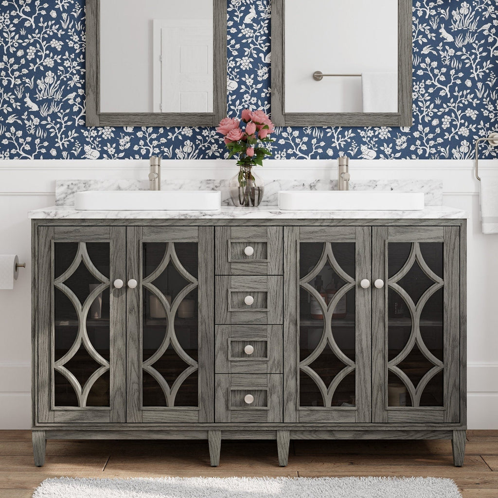 Freestanding 60-inch modern solid wood vanity in gray-stone finish with marble-look stone top, two white rectangular sinks and brushed nickel faucets, decorative glass-front doors with geometric lattice and central stacked drawers.