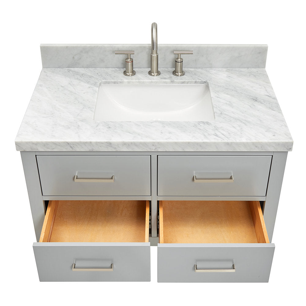 Modern 37-inch solid wood bathroom vanity in stone gray with a marble stone countertop and integrated white ceramic sink, brushed-nickel faucet and pulls; two lower drawers open showing natural wood interiors.
