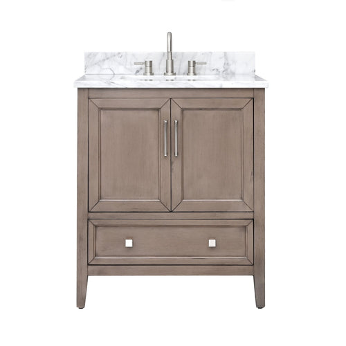 Front view of a modern solid wood single-sink bathroom vanity in stone finish with a white marble stone top and backsplash, two paneled doors, a lower drawer, and brushed nickel faucet and hardware.