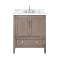 Front view of a modern solid wood single-sink bathroom vanity in stone finish with a white marble stone top and backsplash, two paneled doors, a lower drawer, and brushed nickel faucet and hardware.