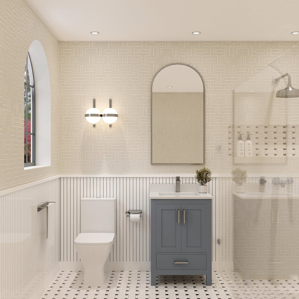 24-inch single-sink solid wood vanity with a stone top and ceramic basin in a gray-stone finish, freestanding with soft-close cabinet doors; shown in a modern-contemporary bathroom with arched mirror, sconce, toilet and glass shower.