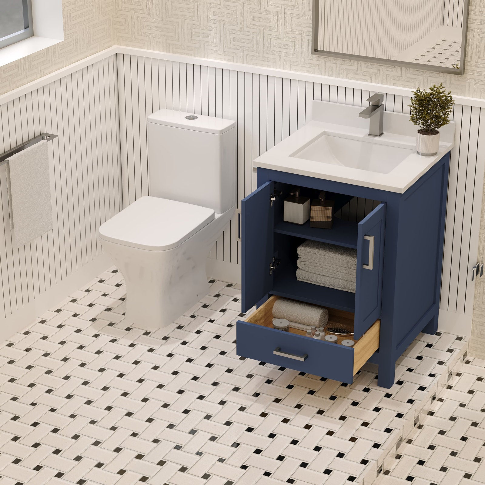 Modern 24-inch solid wood bathroom vanity with stone countertop and integrated white ceramic sink; cabinet doors and lower drawer are open to reveal folded towels and toiletries, freestanding beside a toilet on patterned tile.
