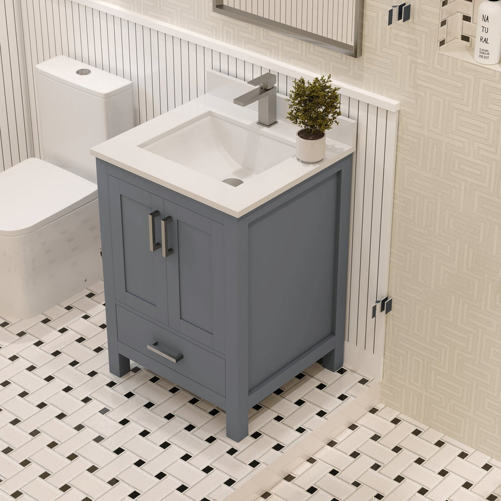 24-inch solid wood bathroom vanity with stone top and integrated white ceramic sink, stone-colored painted base, modern single-handle faucet, brushed metal pulls and a small potted plant on the counter.