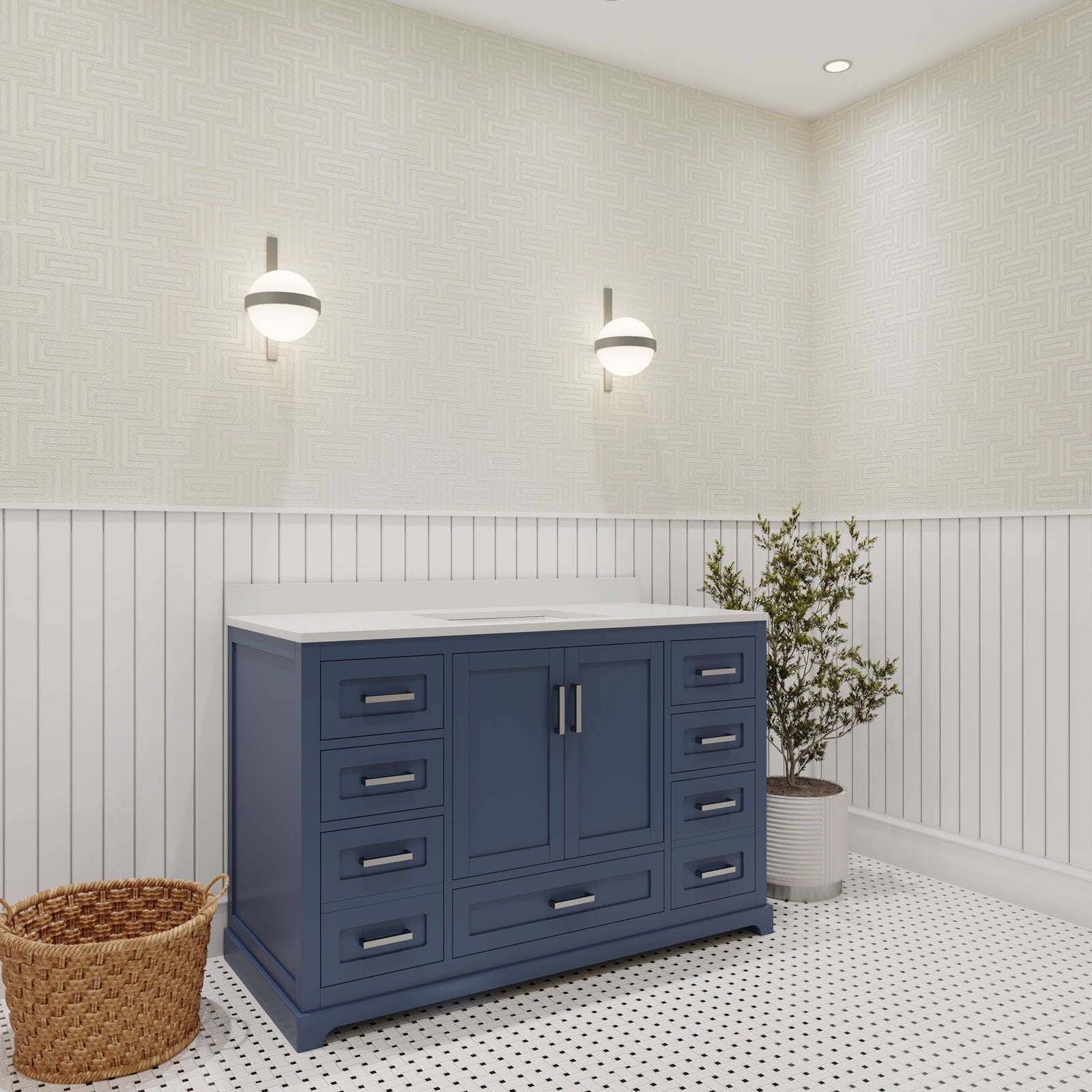 Freestanding 48-inch navy solid-wood bathroom vanity with a white stone countertop and integrated single sink, modern metal hardware and multiple drawers, shown against beadboard walls with sconces, basket and potted plant.