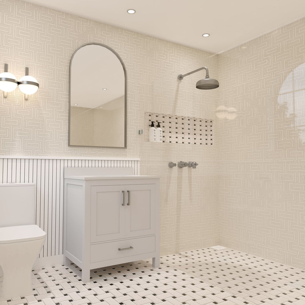 Freestanding 30-inch modern solid wood bathroom vanity in stone finish with stone countertop, two cabinet doors and a lower drawer with brushed metal pulls, shown beside a toilet under an arched mirror in a tiled bathroom.