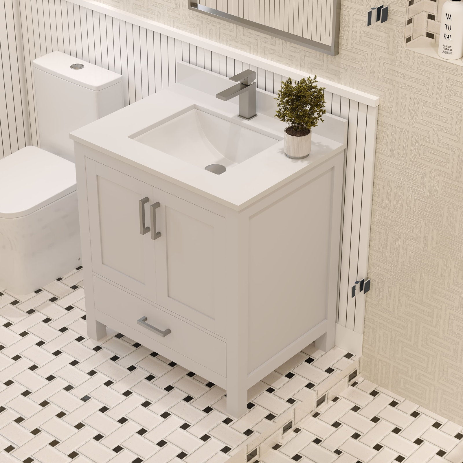 Modern 30-inch freestanding solid wood bathroom vanity in stone finish with a stone top and integrated rectangular ceramic sink, single metal faucet, two doors and a lower drawer with metal handles on black-and-white tile.