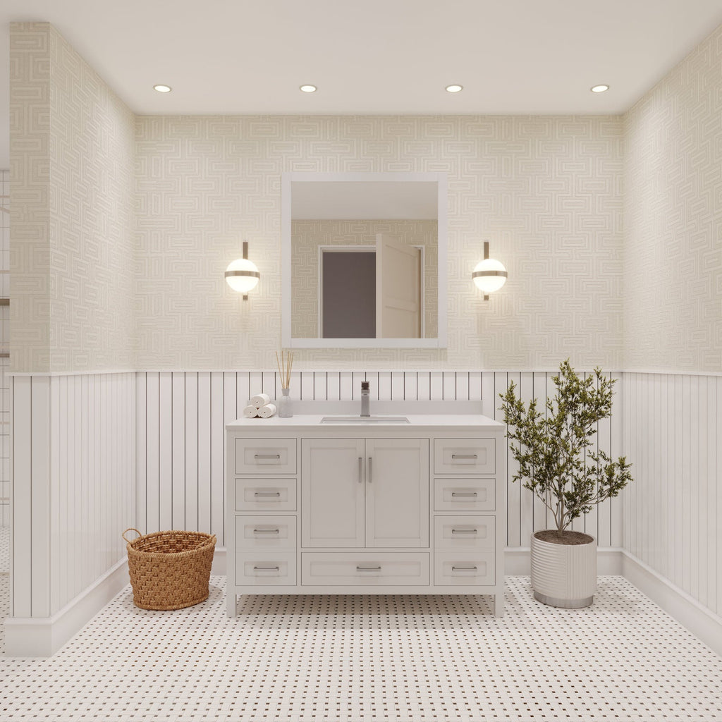 48-inch modern solid-wood bathroom vanity in stone with an integrated ceramic sink and stone top, centered below a framed mirror with two globe wall sconces; white beadboard wainscoting, woven basket, potted plant, and mosaic tile floor.