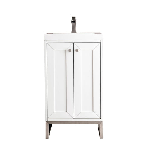 Modern freestanding single-sink bathroom vanity in white solid wood with a stone top, integrated rectangular ceramic basin, brushed-nickel square knobs and metal legs, plus two paneled doors for concealed storage.
