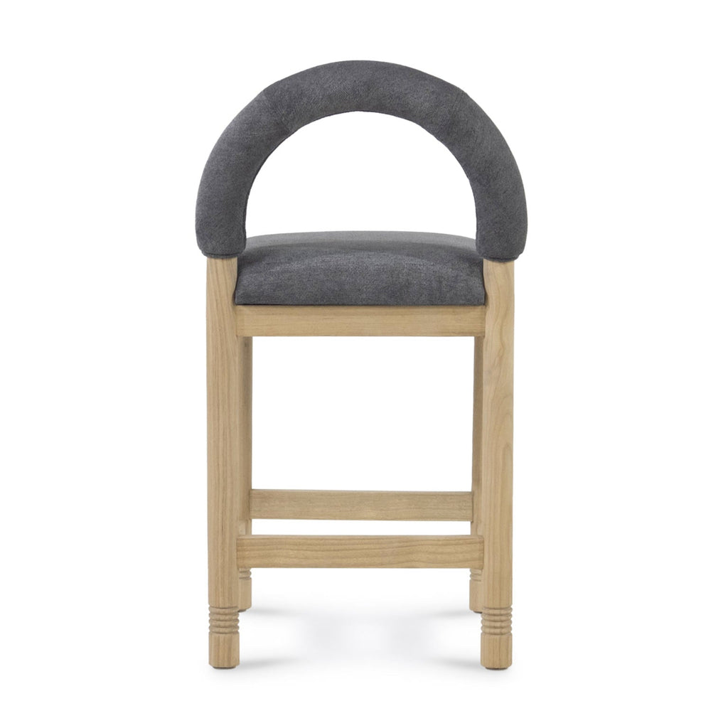 Front view of a counter-height stool with a natural oak frame, charcoal-gray bouclé upholstered seat and rounded low back, featuring straight legs and twin footrest rails on a white background.