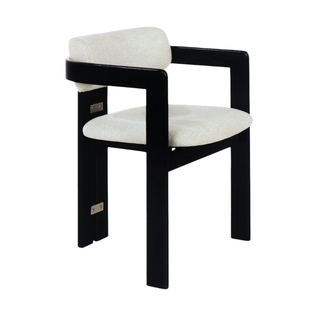 Modern dining chair with a glossy black wood frame, beige boucle upholstered seat and rounded back cushion, curved armrests and visible stainless steel accent plates on the inner legs.