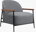 Modern accent lounge chair upholstered in textured grey boucle fabric, featuring curved wooden armrests and a slim black metal frame with tapered legs.