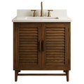 Walnut wood vanity with louvered double doors, white quartz countertop with short backsplash, integrated rectangular undermount sink and brass widespread faucet.