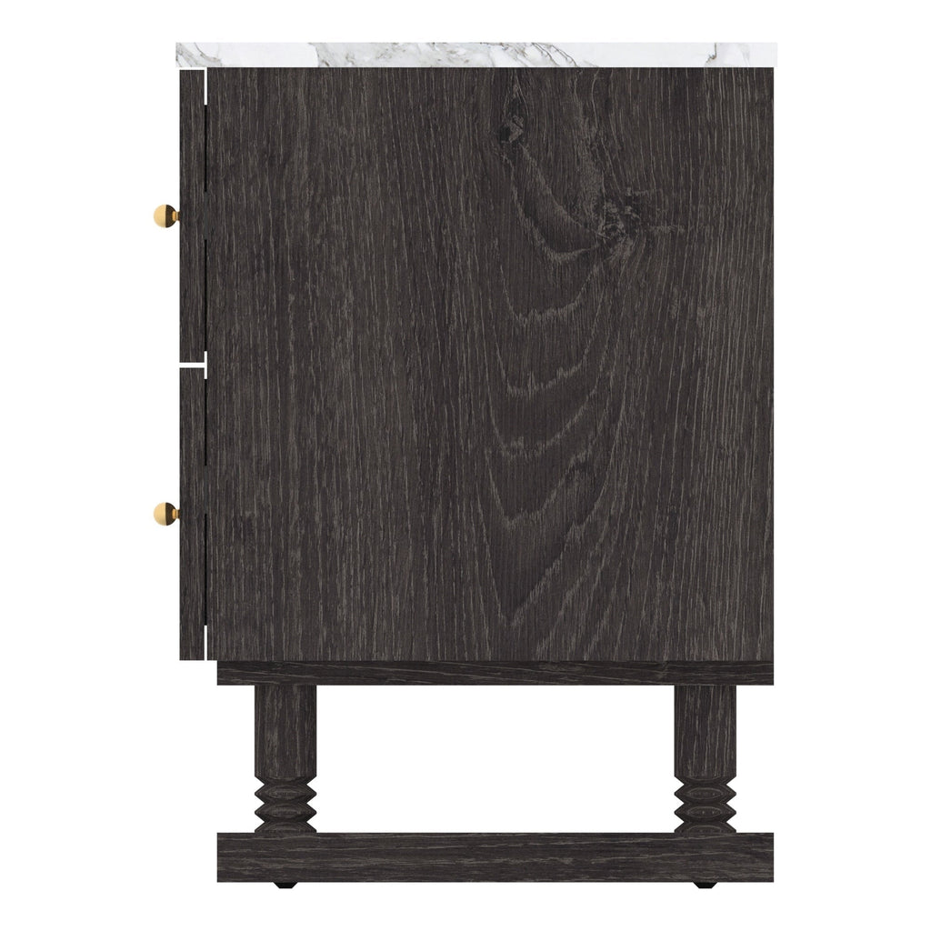 Side view of a black wooden nightstand with a white marble top showing gray veining, two drawers with round gold knobs, and turned legs joined by a stretcher base in a glam contemporary style.