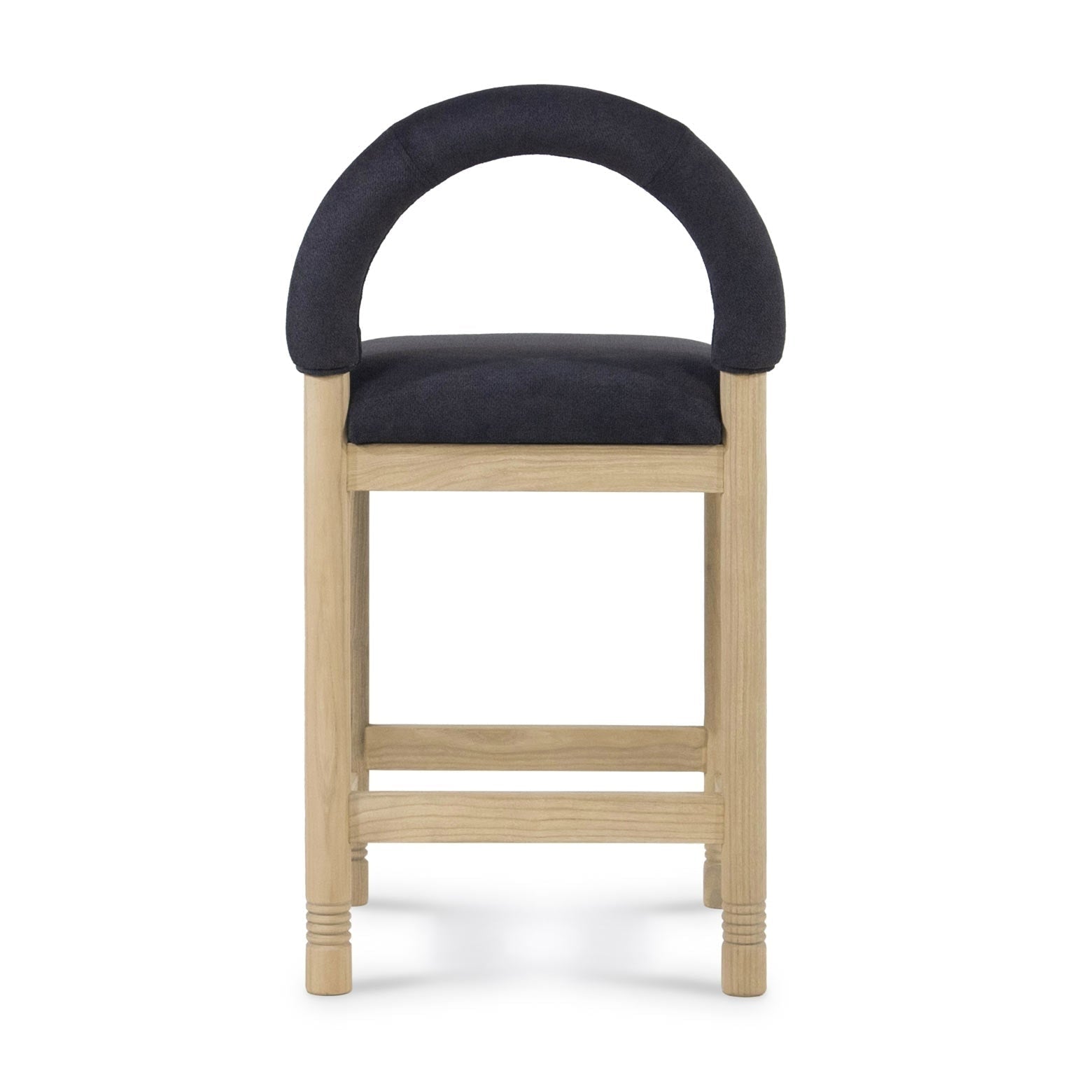 Front view of a bar/counter stool with a natural oak frame and low arched back upholstered in charcoal bouclé fabric, padded seat and horizontal oak footrest rails.