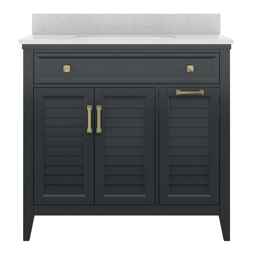Freestanding solid wood single-sink bathroom vanity in charcoal finish with a white speckled stone countertop and integrated basin, featuring louvered cabinet doors and brass drawer pulls and handles.