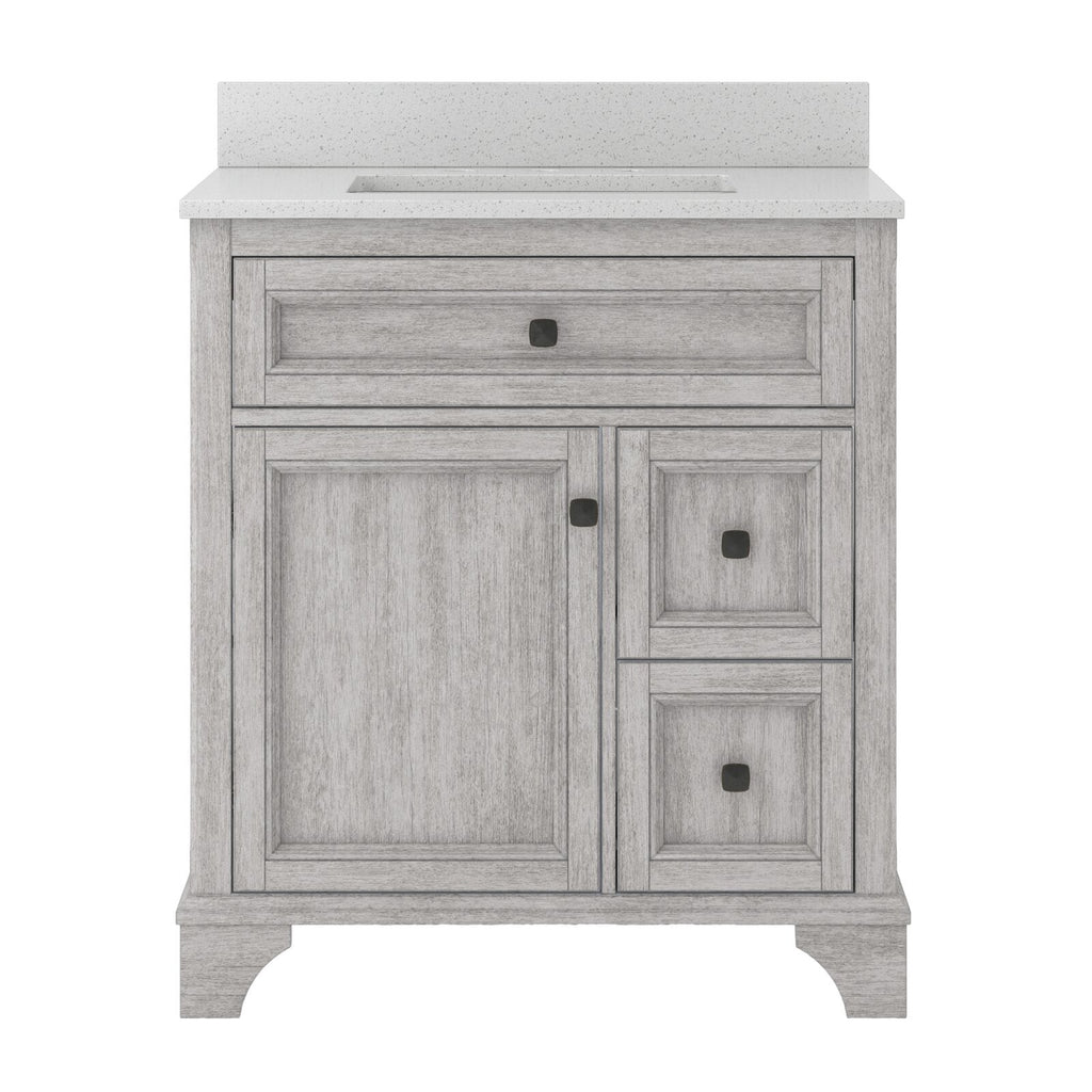 Front view of a modern solid wood bathroom vanity in a whitewashed finish with a white quartz countertop and integrated rectangular sink, one cabinet door and two drawers with dark square knobs.