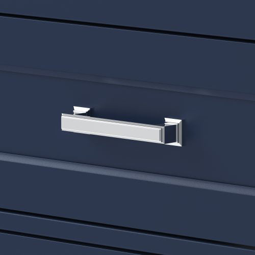 Close-up of a polished chrome rectangular drawer handle mounted on a stone-colored solid wood modern vanity drawer with horizontal recessed paneling.