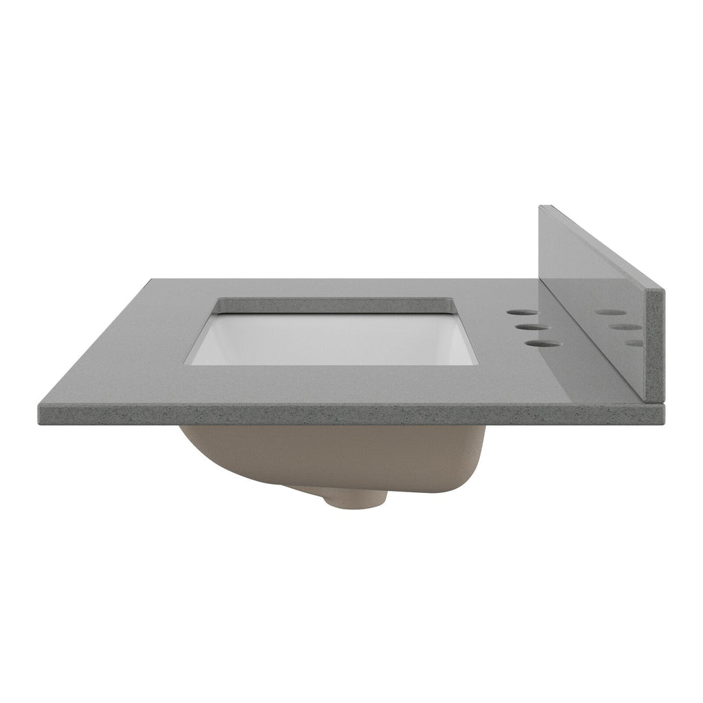 Stone-colored vanity top with a recessed rectangular white ceramic sink, matching stone backsplash on the right and three predrilled faucet holes; undermount sink basin is visible beneath the counter.