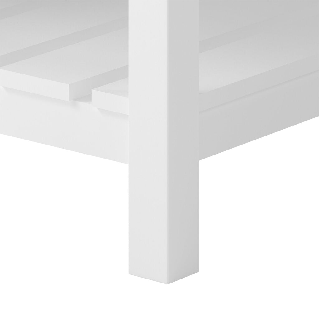 Close-up of a white-painted solid wood vanity leg and slatted lower shelf corner, showing a square post and layered shelf boards in a contemporary style.