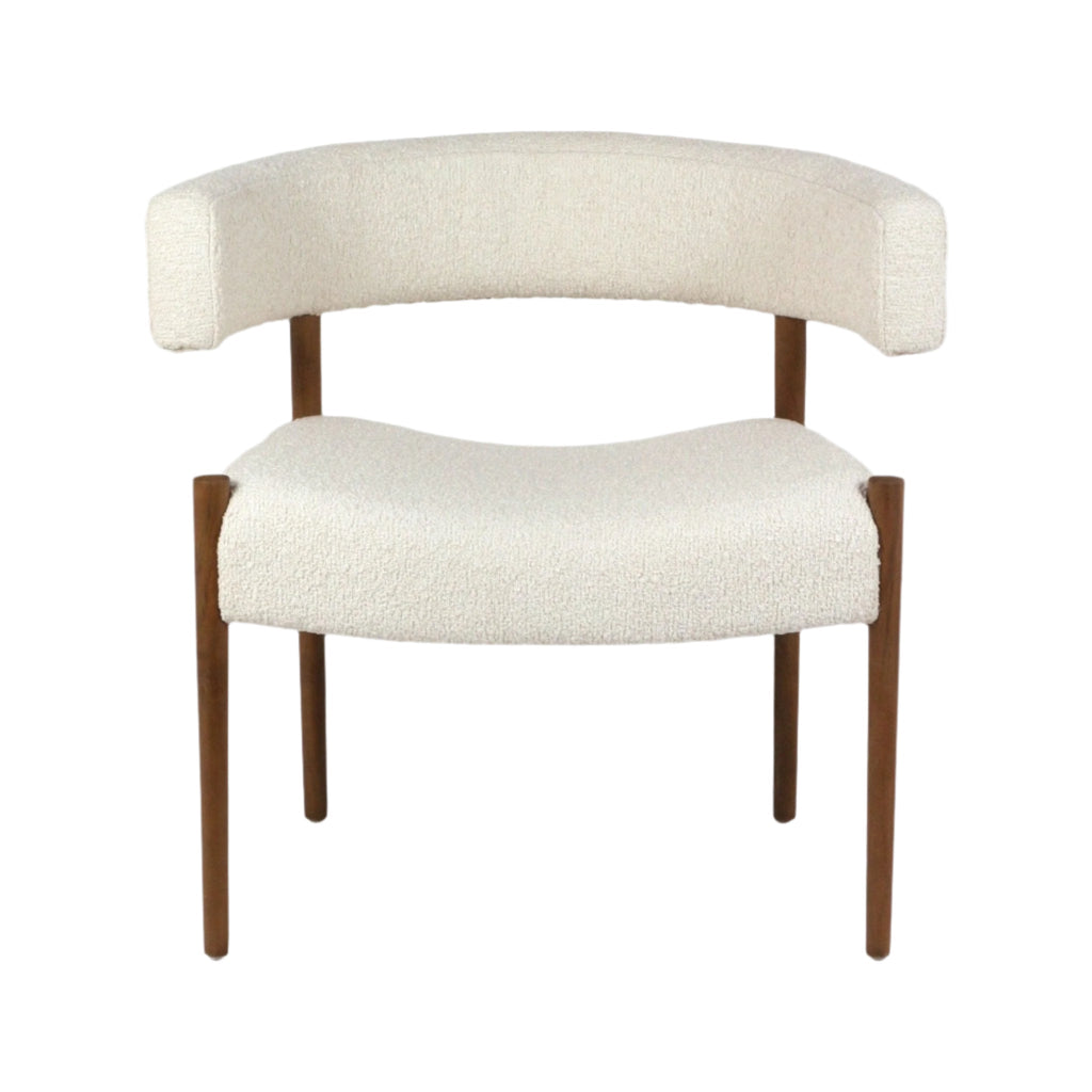 Cream alpaca bouclé upholstered dining chair with a curved open-back ring backrest, cushioned seat and four tapered natural wood legs in a modern mid-century style.