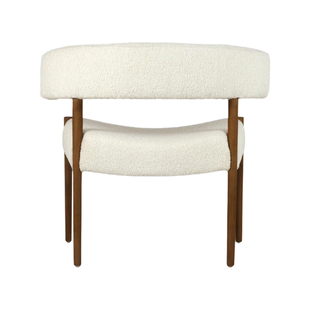 Front view of a cream boucle dining chair with a curved upholstered back and seat, supported by natural wood legs in a modern, mid-century-inspired silhouette.