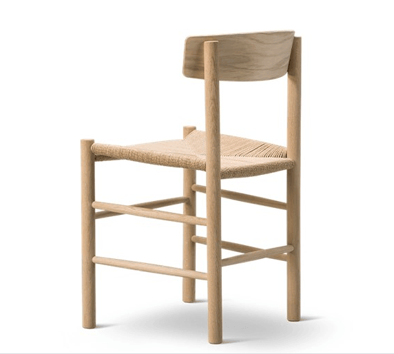 Rear three-quarter view of a Danish woven dining chair in natural oak, showing a hand-woven rope seat, rounded solid oak legs with horizontal stretchers, and a gently curved low backrest.