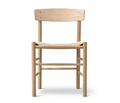 Front view of a Danish-style dining chair in natural oak with a tan woven rope seat, rounded solid-wood legs and a low curved backrest, in a Mid-Century Scandinavian minimalist design.