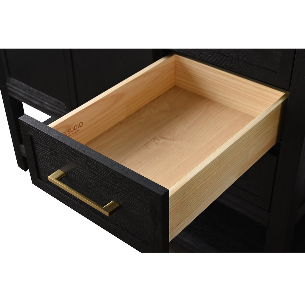 Open drawer of a black solid-wood bathroom vanity showing a light natural wood interior and a slim brushed-brass rectangular pull, highlighting modern contemporary detailing.