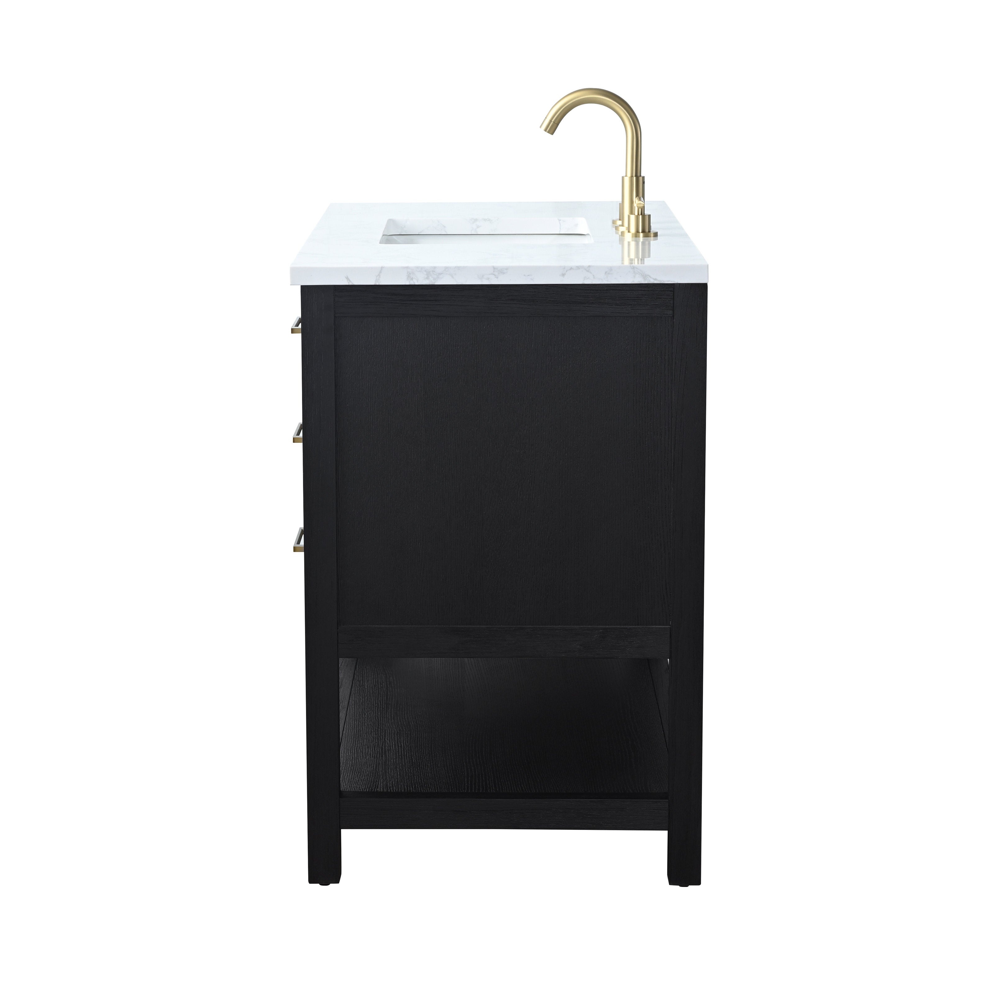 Side view of a modern black solid wood bathroom vanity with a white marble stone top, integrated rectangular sink, open lower shelf, and brass faucet with matching brass drawer pulls.