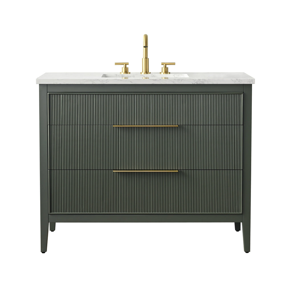 Modern 42-inch single-sink freestanding bathroom vanity in stone-colored solid wood with ribbed drawer fronts, white stone countertop and undermount ceramic sink, paired with brushed brass faucet and slim brass drawer pulls.