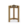 Contemporary teak tripod side table with solid wood legs and a round gold-brass tray top with raised rim, shown on a clean white background.