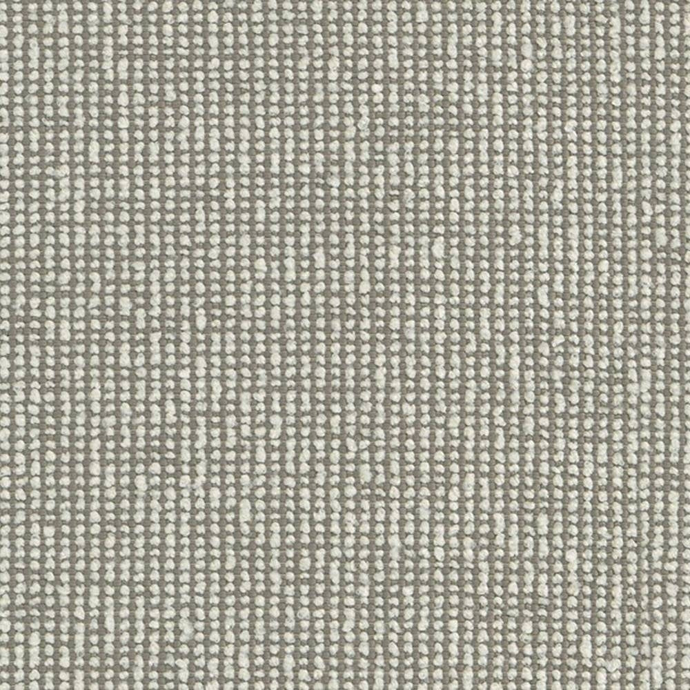 Close-up of neutral beige woven upholstery fabric showing a small-loop textured weave of 100% polyester with light cream dots on a taupe background, suitable for sofas and heavy-duty indoor use.