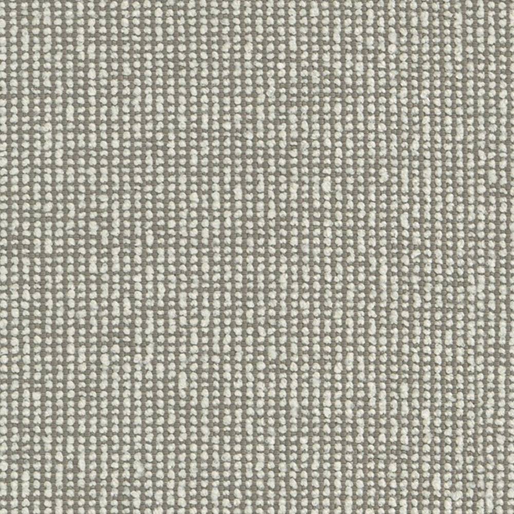 Close-up of neutral beige woven upholstery fabric showing a small-loop textured weave of 100% polyester with light cream dots on a taupe background, suitable for sofas and heavy-duty indoor use.