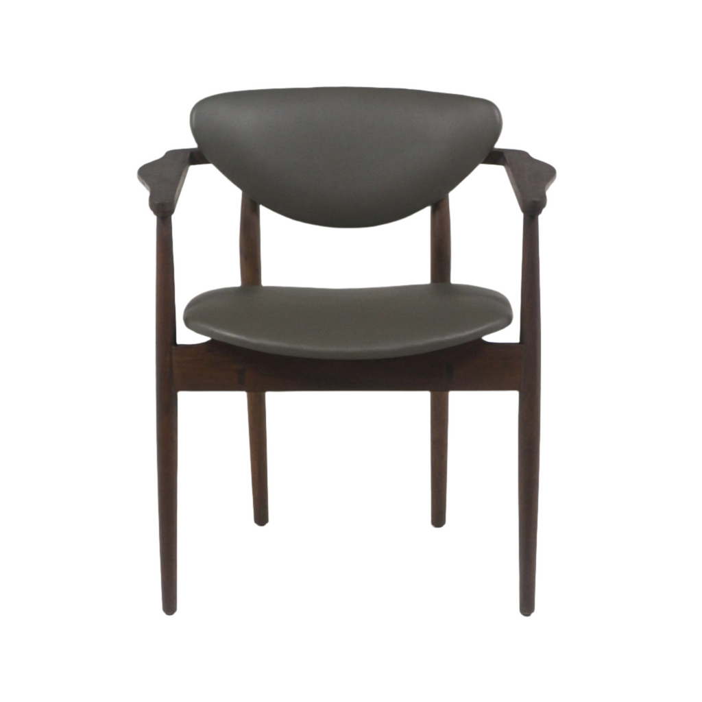 Front view of a mid-century modern dining chair with dark gray leather upholstery, curved back and seat, teak walnut wood frame, sculpted armrests and tapered legs on a white background.