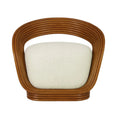 Front view of a modern accent chair featuring a curved natural cane rattan frame and a plush white boucle upholstered seat cushion.
