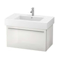 Floating 33.5-inch white bathroom vanity with a thick white stone top and integrated rectangular ceramic sink, glossy solid wood cabinet, long chrome bar handle and single-hole chrome faucet.