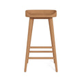 Front view of a backless solid teak outdoor bar stool with a gently contoured natural teak seat, tapered legs and three horizontal stretchers, finished for coastal patio or outdoor bar seating.