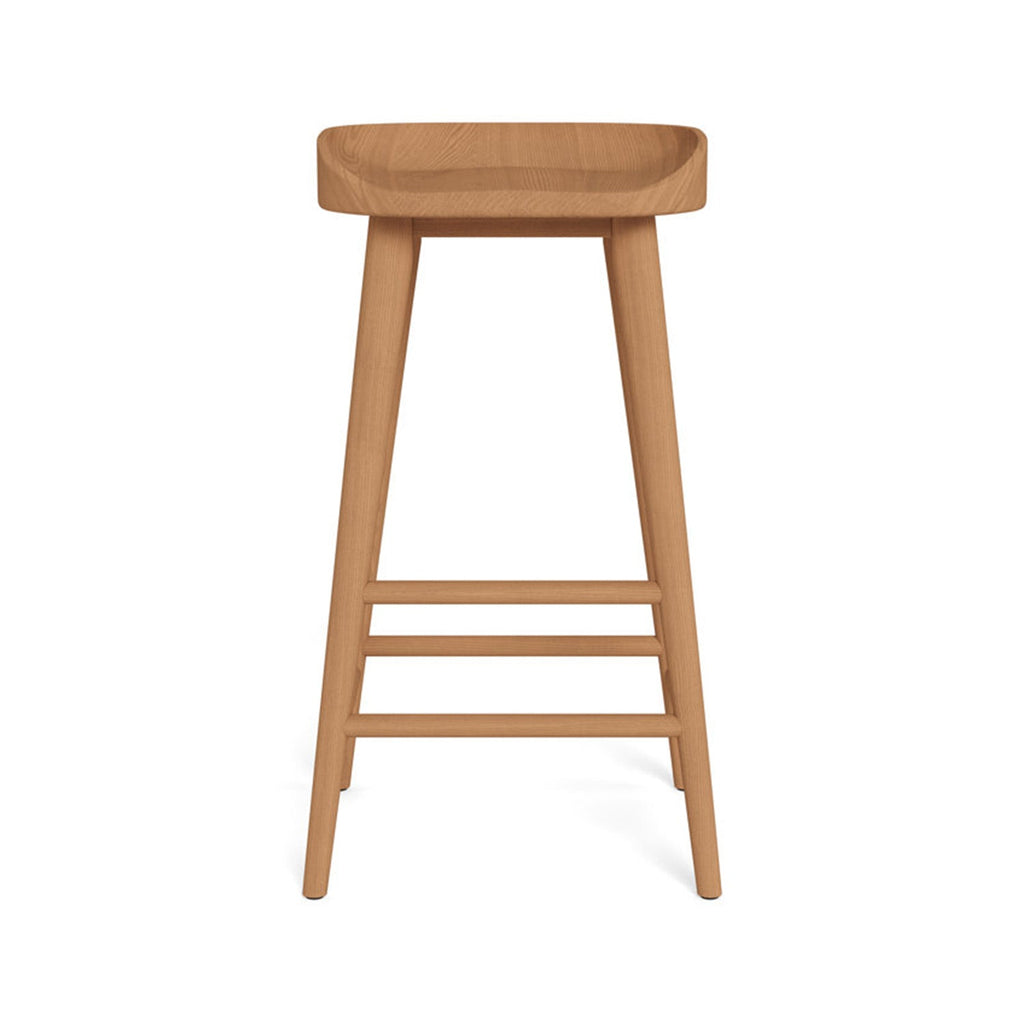 Front view of a backless solid teak outdoor bar stool with a gently contoured natural teak seat, tapered legs and three horizontal stretchers, finished for coastal patio or outdoor bar seating.