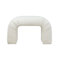 Cream boucle upholstered arched vanity seat with a rounded U-shape and cushioned, backless design shown on a white background.