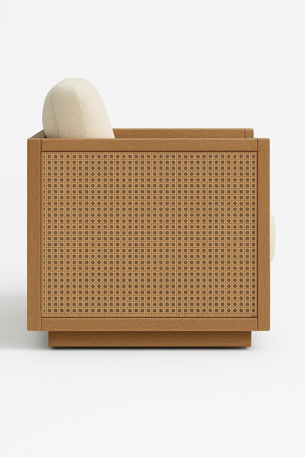 Side profile of a teak indoor-outdoor lounge chair showing a natural teak frame, handwoven cane side panel and a cream fabric back cushion on a low, boxy modern base.