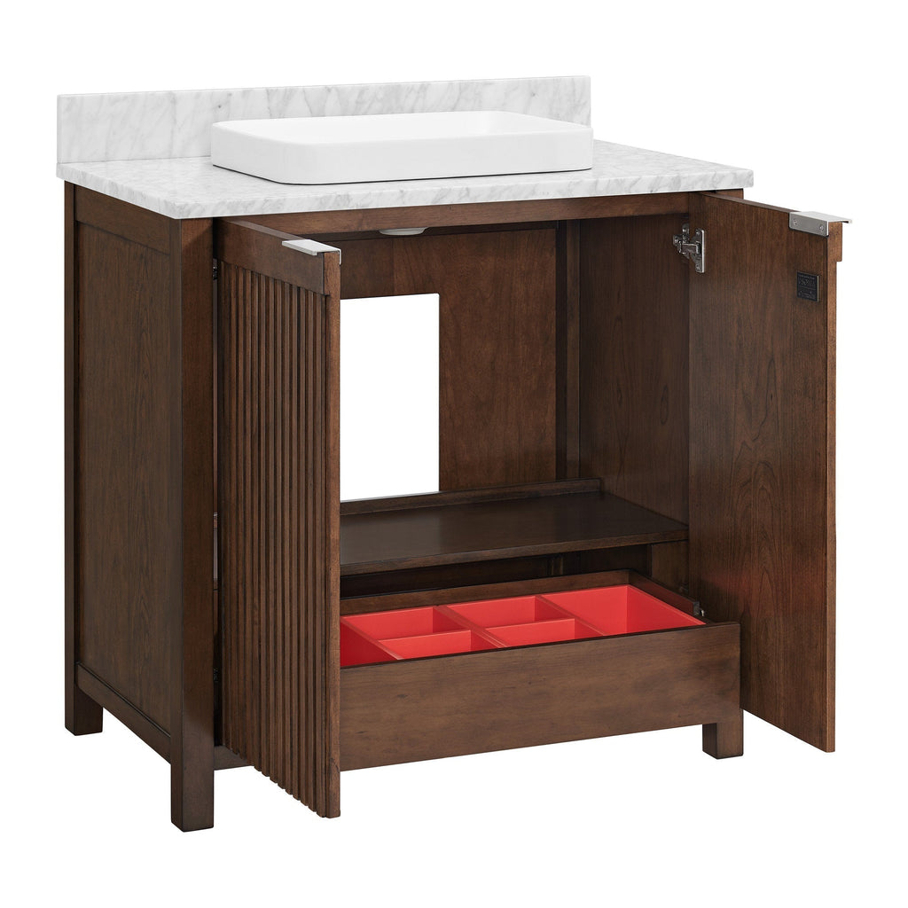 Solid wood 36-inch single-sink bathroom vanity in warm brown with a stone marble top and white rectangular vessel sink; fluted cabinet doors open to an interior shelf and a red divided storage drawer.