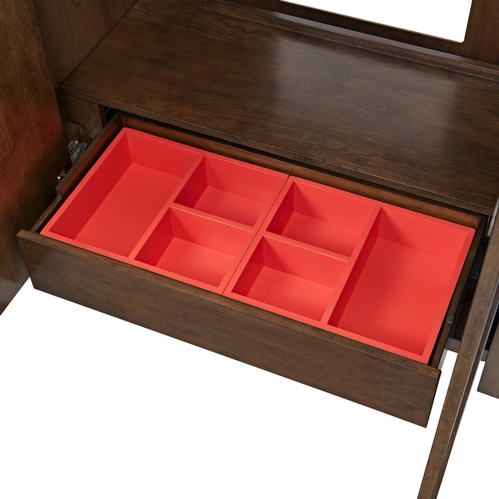 Open solid wood bathroom vanity drawer revealing a bright red compartment organizer with six sections for toiletries and accessories, shown inside a dark brown modern vanity to highlight built-in storage.