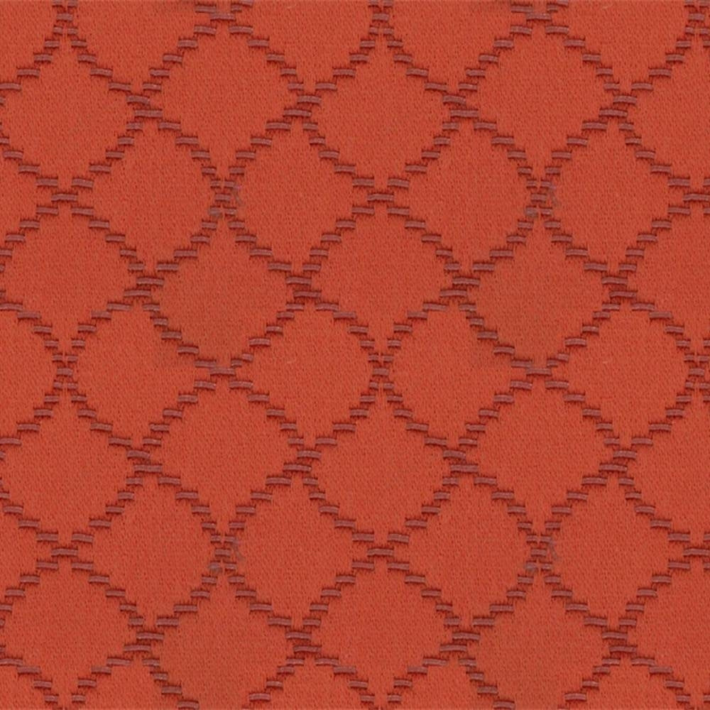 Close-up of a rust-orange trellis-pattern upholstery fabric with textured stepped-diamond weave, 55% cotton 45% polyester blend suitable for contemporary sofas.