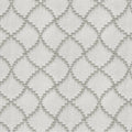 Close-up of natural-colored trellis upholstery fabric showing a repeating diamond lattice in soft beige with raised stitch detailing; 55% cotton, 45% polyester blend suitable for contemporary indoor sofas.